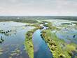 © Veam/Westend61 - Ivory Coast, Sassandra, Aerial view of lagoons with clear line of horizon in background