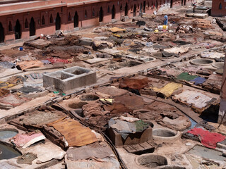 high angle shot of leather drying at one of the ancient tanneries in marrakesh