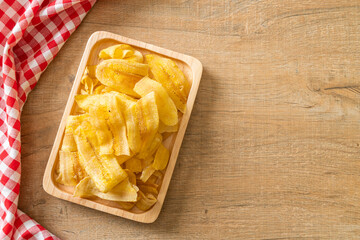 Wall Mural - Banana Chips - fried or baked sliced banana