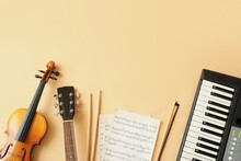 Different Musical Instruments And Music Notes On Color Background