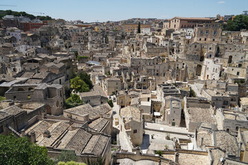 Sassi di Matera inner city aerial panoramic cityscape, popular tourist travel place, guided tour concept, Basilicata, Italy