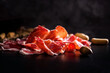 Iberian Ham. acorn-fed Iberian ham. Portion of Iberian ham on slate
