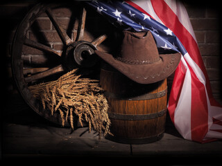 Wooden oak barrel and american flag on rustic background. USA holidays .