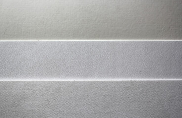 Background of three white paper stripes.