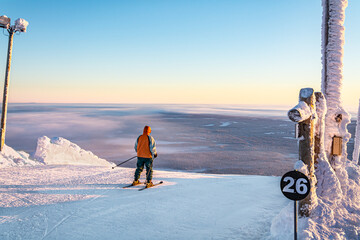 Skier at the start of run 26 - The Black Run, Yllas, Finland