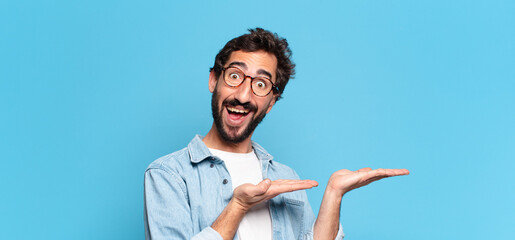 Wall Mural - young crazy bearded man. happy and surprised expression