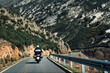 Motorbikers on Mountain Road. Riding and Having Fun Driving the Empty Road on a Motorcycle Tour Journey.