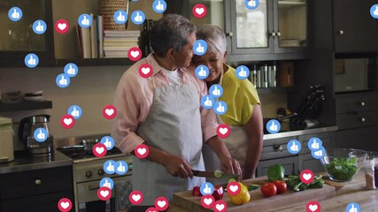 Canvas Print - Animation social media like and love icons over senior couple cooking together in kitchen