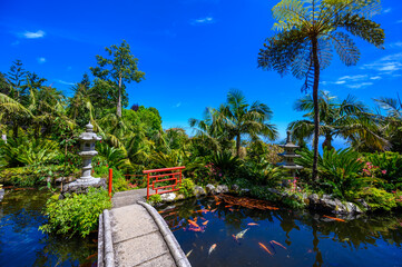 Monte Palace - Tropical Garden with Waterfalls, Lakes and traditional buildings above the city of Funchal - popular tourist destination in Madeira island, Portugal.