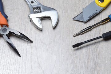 tools for minor home repairs are on the countertop. view from above.