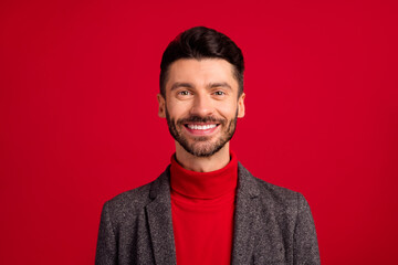 Photo of optimistic nice grey brown hair man wear red sweater jacket isolated on vivid color background