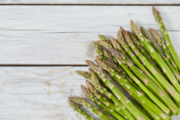 Sticker - fresh green asparagus on wooden surface