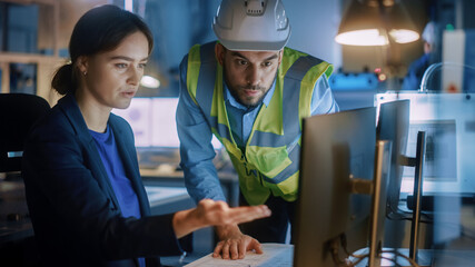 Poster - Modern Factory Office: Male Project Manager Talks to a Female Industrial Engineer who Works on Computer. Professional Teamwork, Specialists Solving Problems, Finding Solutions