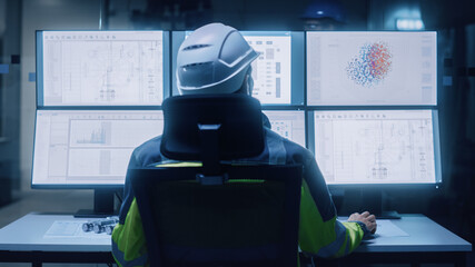 Poster - Industry 4.0 Modern Factory: Facility Operator Wearing Hardhat and Safety Vest Controls Workshop Production Line, Uses Computer with Screens Showing Machinery Control Operation UI. Back View Shot