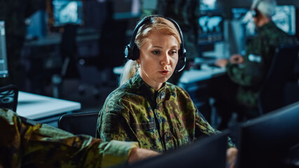 Poster - Beautiful Female Military Surveillance Officer in Headset Working in Central Office Hub for Cyber Operations, Control and Monitoring for Managing National Security, Technology and Army Communications.