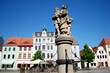 cottbus, germany, altmarkt market place with well and historic houses