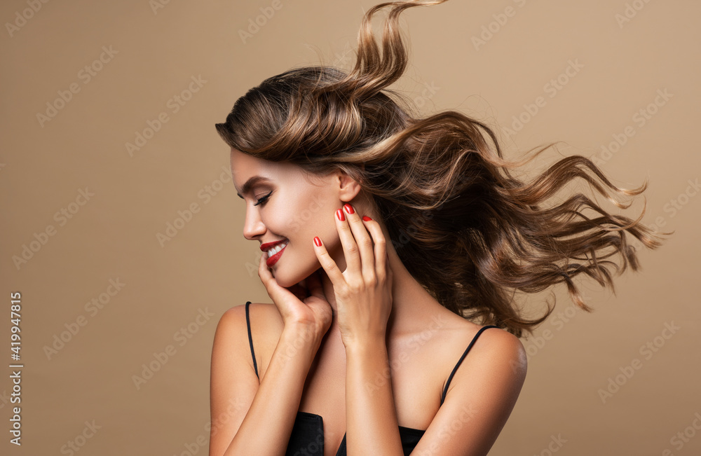 Beautiful woman in profile with long and shiny wavy hair . Beauty model ...