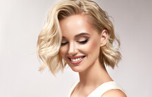 Beautiful Model Girl With Short Hair .Beauty Woman With Blonde  Curly Hair.  Hair Dye .Fashion, Cosmetics And Makeup