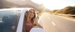 © neonshot - Happy woman driving a car and smiling, traveling on the sunny summer day.