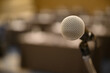© nattanan - Microphone over the blurred business people forum Meeting Conference Training Learning Coaching Concept, Blurred background.