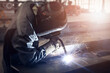 © Benjamin Salazar  - Cutting of steel beam with sparks fly from gas in fabrication factory.