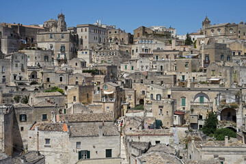 Matera historic site aerial cityscape with church, popular tourist travel place, guided tour concept, Basilicata, Italy