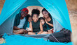 group of family asian and black people holiday camping.  family black people and asian having fun in the park. family holiday and camping  adventure activity. 