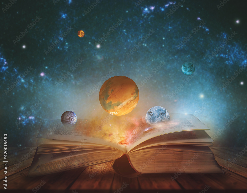 Book of the universe - opened magic book with planets and galaxies. Elements of this image furnished by NASA - obrazy, fototapety, plakaty 
