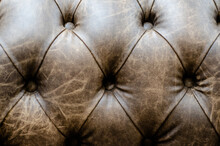 Close-up Of Leather Upholstery Texture Background.