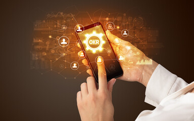 Hand using smartphone with technology concept