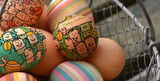 Fototapeta  - Fresh organic chicken eggs with Easter decoration, in a metal basket