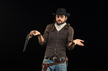 Wall Mural - Cowboy with guns. Studio shooting