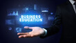 © ra2 studio - Hand of Businessman holding motivational message