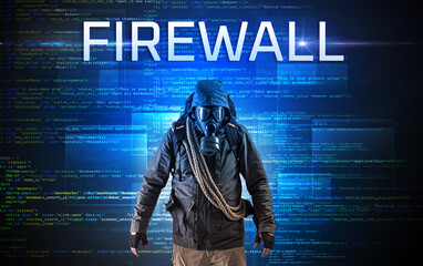 Faceless hacker on code background