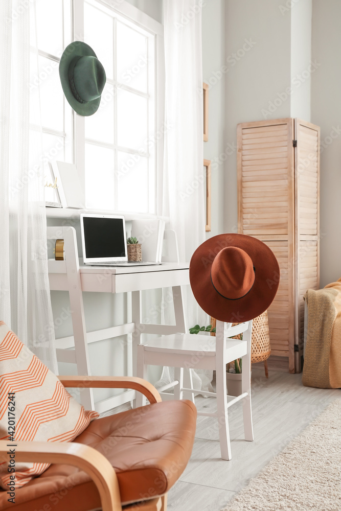 Interior of modern stylish room with comfortable workplace