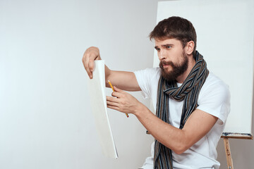 Wall Mural - Man in white t-shirt artist drawing creativity work