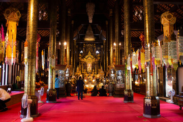 Interior decoration design ubosot ordination hall for thai people and foreign travelers travel visit respect praying in Wat Pa Daraphirom Temple at Mae Rim on December 2, 2020 in Chiang Mai, Thailand