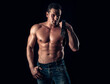 © Volodymyr - Man with muscular body and leather belt. Punishment concept. Brutal guy with sexy naked torso. Topless male model.