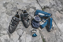 Climbing Shoes, Belaying Carabiners, Loops, Ropes, Bag For Magnesia, Belay System. Climb Gear Equipment On Rock