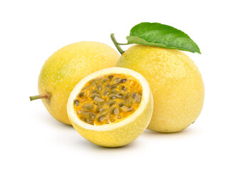 Wall Mural - yellow passion fruit with cut in half and green leaf isolated on white background..