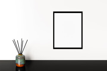 Aroma sticks. Empty frame on the wall.