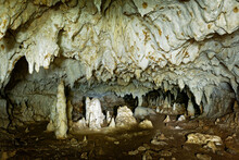 Kiwengwa Caves On Zanzibar Island In Tanzania, Worship Locals Ancestors, Gifts To The Holy Stones, Stalagmites And Stalactites Formed By Water Dissolving Coral Stones