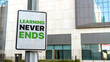 © WD Stock Photos - Learning never ends sign in a downtown city setting