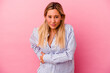 © Asier - Young mixed race woman isolated on pink background having a liver pain, stomach ache.