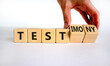 Test or testimony symbol. Businessman turns wooden cubes and changes the word 'test' to 'testimony'. Beautiful white background. Business, test or testimony concept. Copy space.