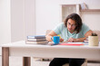 © Elnur - Young male student preparing for exams at home