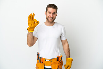 Young electrician man over isolated white wall showing ok sign with fingers