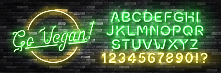 Vector realistic isolated neon sign of Go Vegan with easy to change color font alphabet for decoration and covering on the wall background. Concept of vegetarian cafe and eco product.