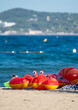© barmalini - Family summer vacation on French Riviera, France, view on blue sea, sandy beach and red inflatable floating toy
