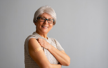 Wall Mural - Senior woman after vaccination.